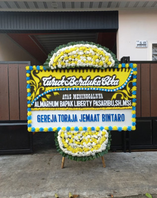 Papan Bunga Duka di Mlarak